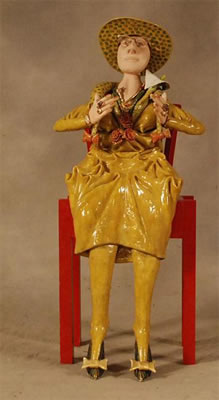 Femme assise aux bijoux et à l'arum
