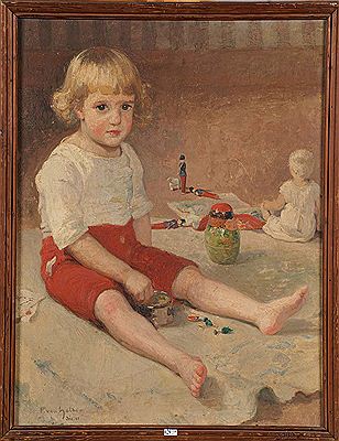 Portrait d'un enfant entouré de ses jouets