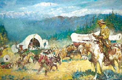 Wagon train making its way through mountians