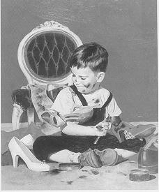 Boy polishing mother's sh