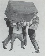 Four men hoisting crate