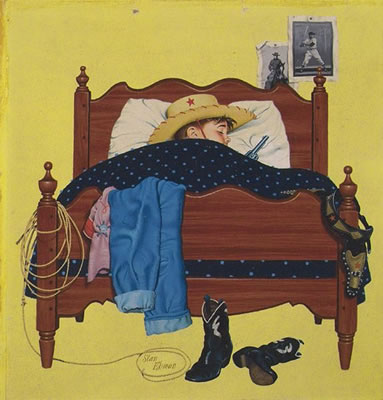 CHILD COWBOY IN BED