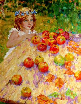 By the table with apples