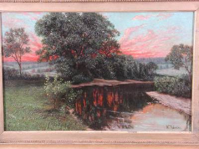 Serene river scene w/dramatic glowing pink sunset
