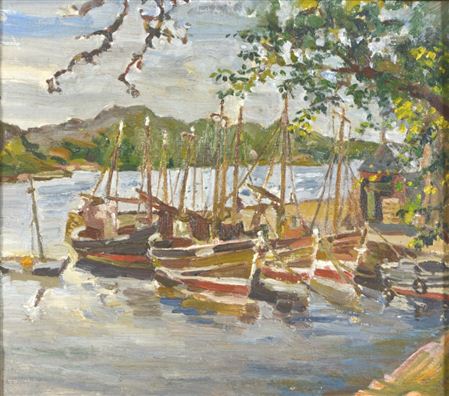 Sailing vessels moored at a quay