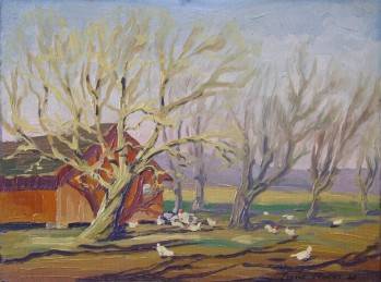 Chickens under trees outside red chicken coop