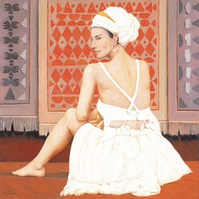 Giovane donna seduta e tappeti