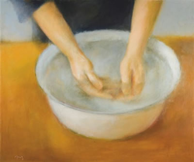 A woman washing her hands