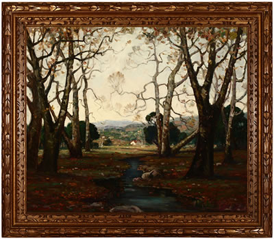 Sycamore trees and creek with a view toward the foothills