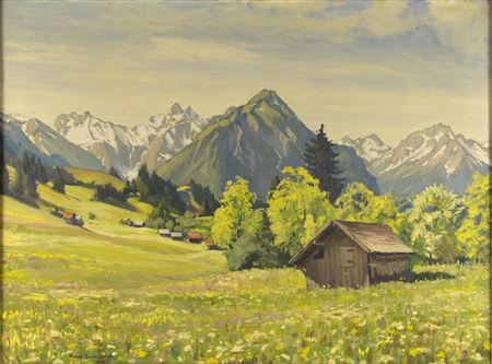 Frühlingslandschaft im Allgäu mit blühenden Wiesen und Gebirgspanorama