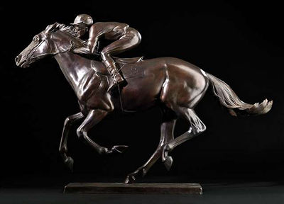Pferd mit Jockey im vollen Galopp