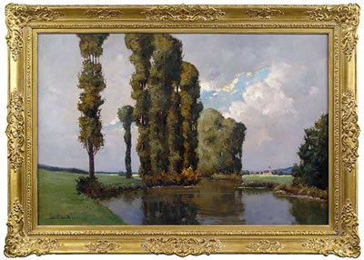 Summery landscape at a lake with a small village in the background