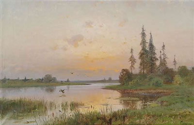 Extensive landscape at a lake at sunset