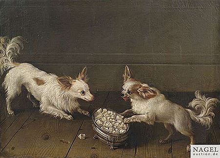 Two Dwarf Spaniel at a sugar bowl