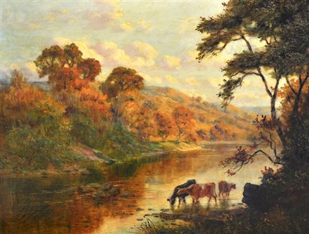 Cattle watering in a mountainous river landscape