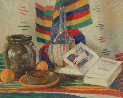 Still life with colorful blanket, wine bottle, open book, fruit, etc