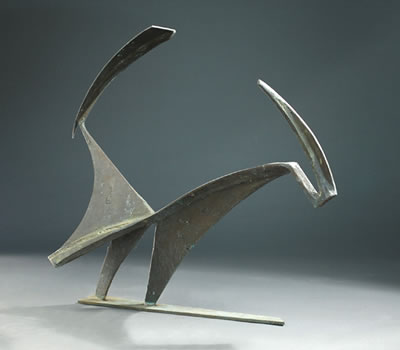 The free form sculpture depicts the outline of a semi-sphere with curved angles
