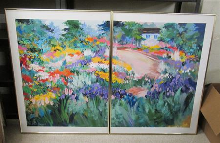 Flower garden with cottage in the background