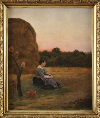 Jeune femme assise au pied d'une meule de foin