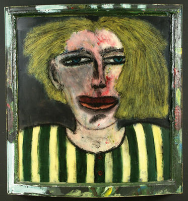 Head of a woman with blue eyes and blond hair