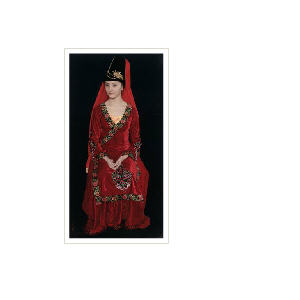 UYGHUR GIRL IN HER COLORFUL DRESS