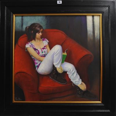 Woman Reading in a Red Chair