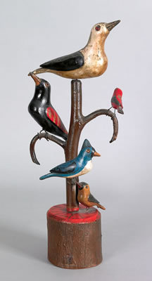 Carved and painted bird tree with five polychrome decorated birds