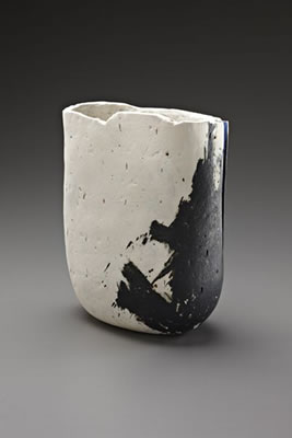 White Vessel With Black Painting And Blue Slit