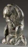Carved green stone figure of a bear