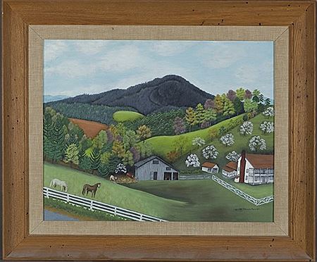 Farm landscape with horses in a fenced pasture