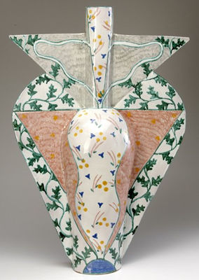 Faience-glazed winged vessel with floral motif