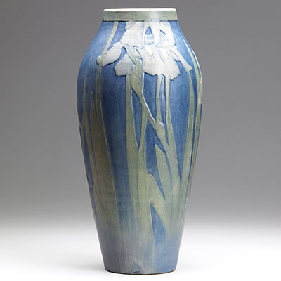 Tall vase with purple irises