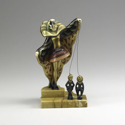 Figure of a puppeteer