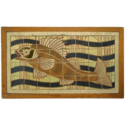 Exceptional tile panel incised and enamel-decorated with fish and waves