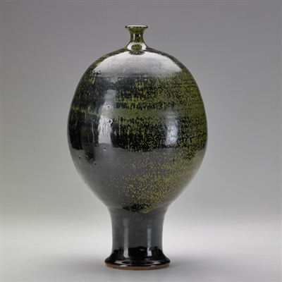 Glazed stoneware bulbous footed vessel