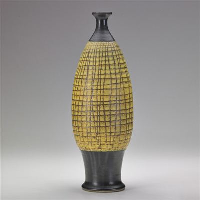 Footed bottle-shaped vase with cross-hatched pattern