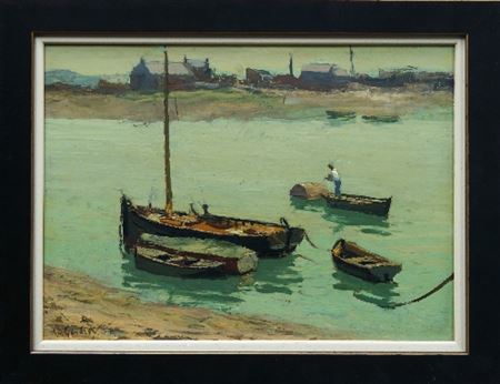 Fisherman and moored boats in an estuary and cottages beyond