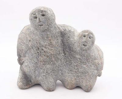 Grey stone carving of a mother with a child to her right side by Lucy Tikiq Tunguak - Auction record, sale price, and art valuation. Compare with similar artists and explore comparable artworks.