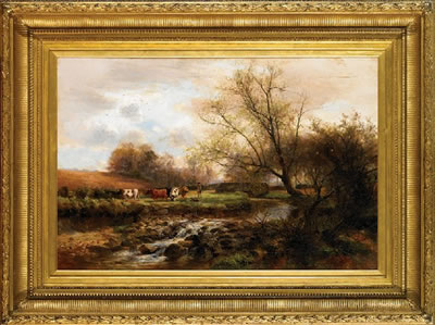 CATTLE GRAZING BY THE STREAM