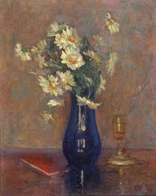 Daisies in a blue vase