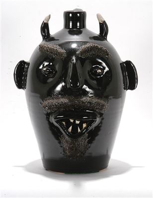 Large Rare Black Devil Face Jug by Evan Brown - Auction record, sale price, and art valuation. Compare with similar artists and explore comparable artworks.