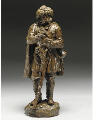 A BRONZE FIGURE OF A CAUCASIAN WARRIOR