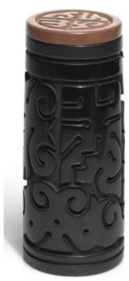 Cylindrical form, deeply carved with a broad frieze of scrolling and idiosyncratic elements