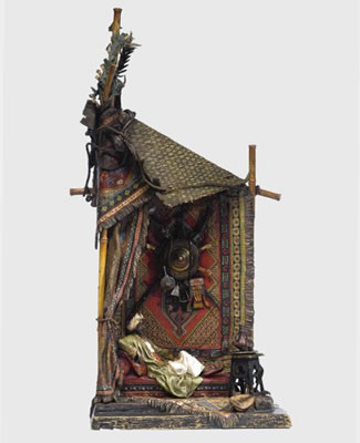 'RECLINING BEDOUIN', A TABLE LAMP