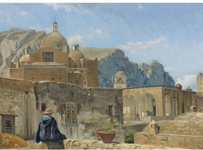 A YOUNG BOY SEATED ON A WALL, OVERLOOKING CAPRI