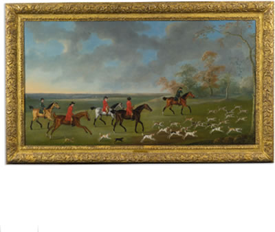 GROUP OF MOUNTED FOX HUNTERS WITH HOUNDS (CASTING TO COVER)