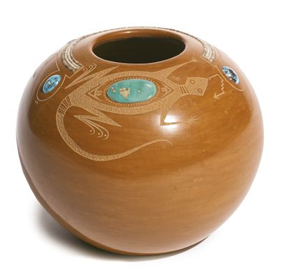 Rounded form, decorated overall with a highly polished sienna slip