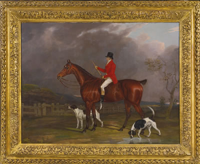 A HUNTSMAN AND HOUNDS