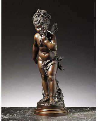 A BRONZE SCULPTURE OF A LITTLE GIRL