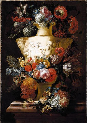 STILL LIFE OF FLOWERS WITH A GARLAND DRAPED AROUND AN URN SCULPTED WITH PUTTI